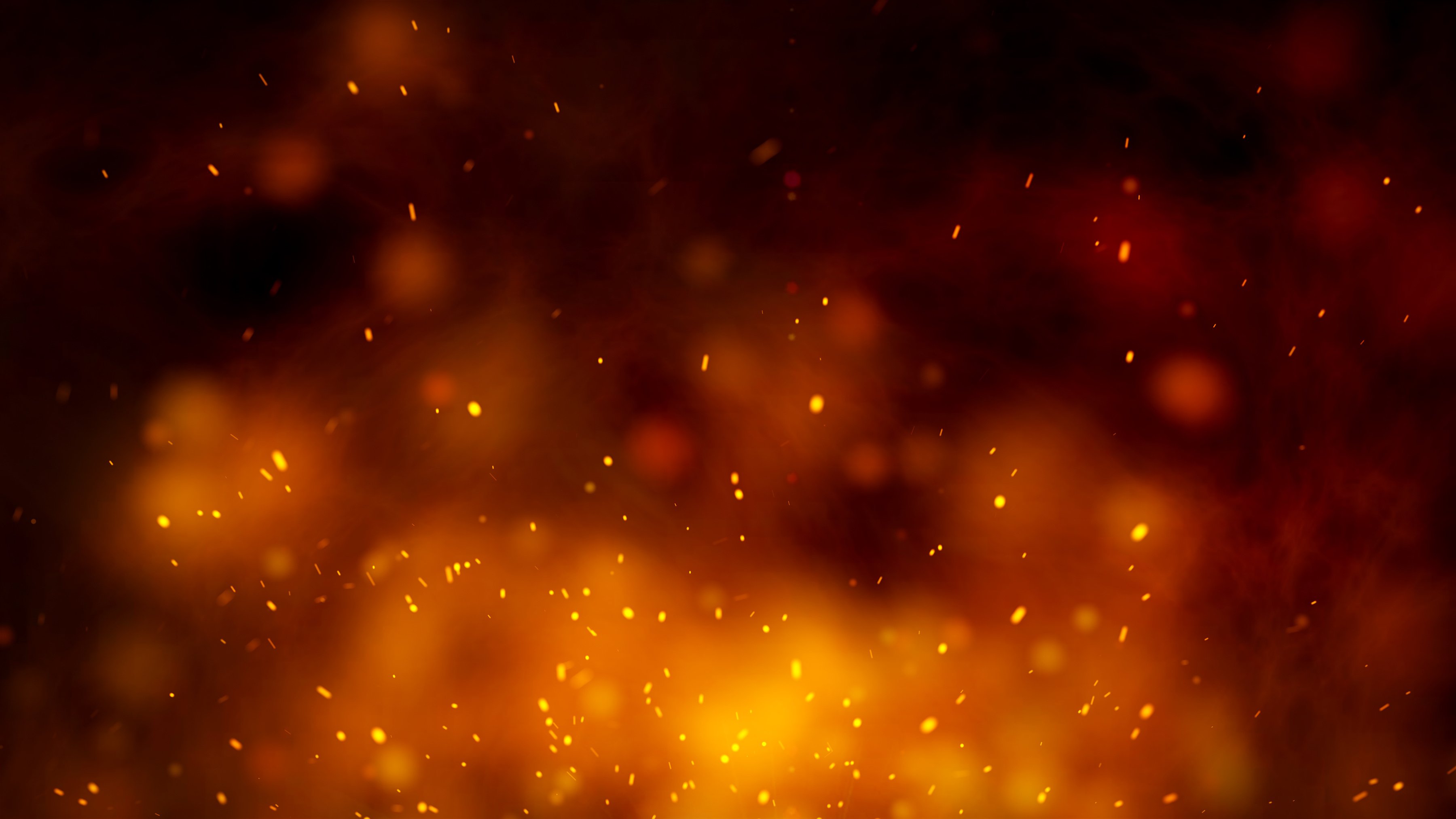 Abstract flame of fire with sparks orange smoke background